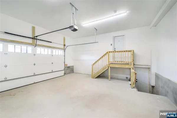 a view of a backyard with large tree