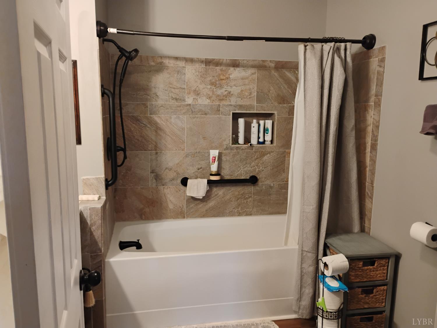 4183 Tye River Road Amherst, VA 24521 - Photo 21 of 67 a bathroom with a shower and a tub