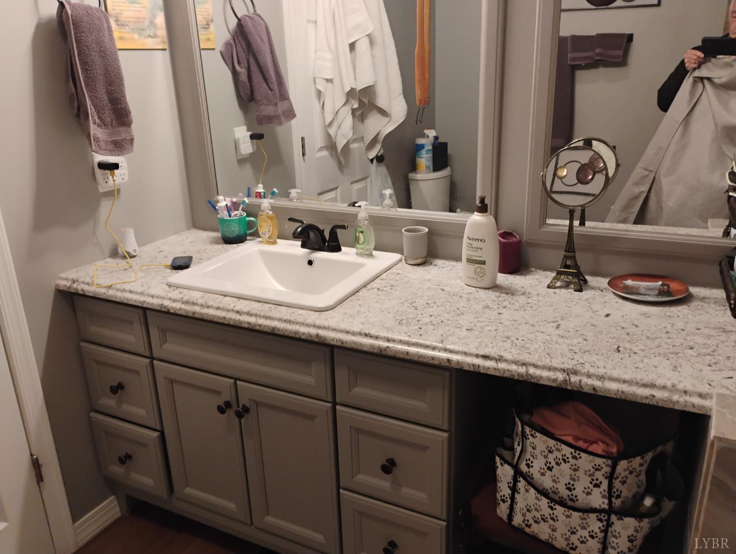 4183 Tye River Road Amherst, VA 24521 - Photo 24 of 67 a bathroom with a granite countertop sink and a mirror