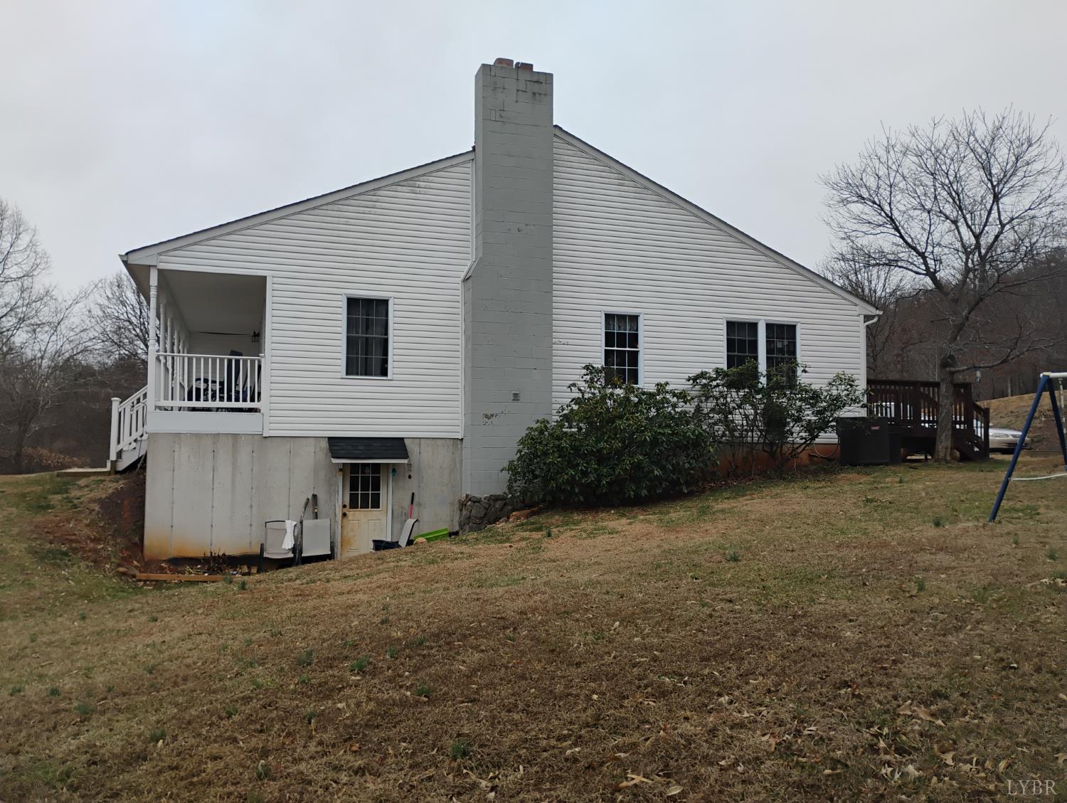 4183 Tye River Road Amherst, VA 24521 - Photo 39 of 67 a view of a house with backyard and chairs