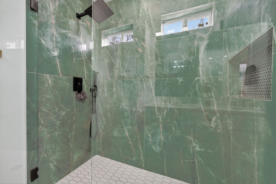 504 West Croslin Street Austin, TX 78752 - Photo 12 of 22 a bathroom with a shower