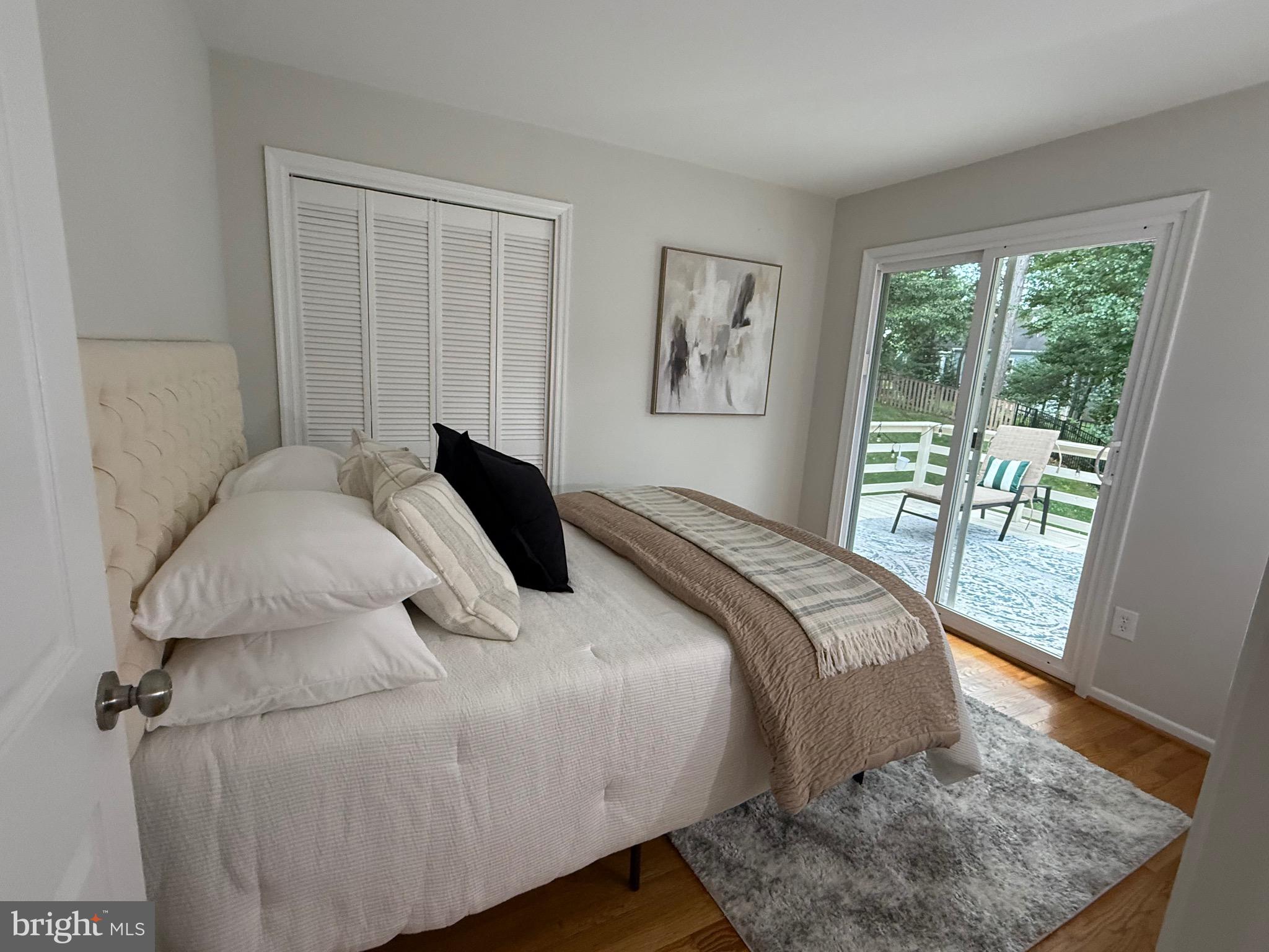 9713 Rhapsody Drive Vienna, VA 22181 - Photo 3 of 4 Upper Level Bedroom with Private Deck