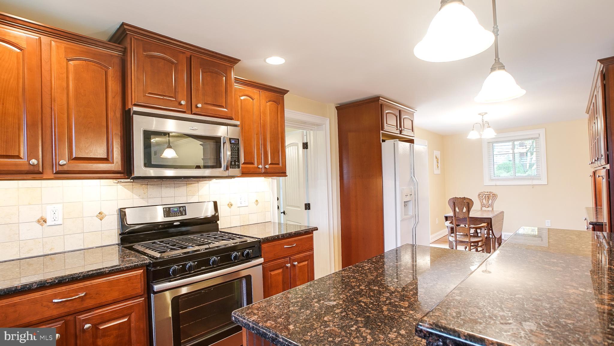 2026 Berkley Road Norristown, PA 19403 - Photo 8 of 31 Tile back splash and granite counters