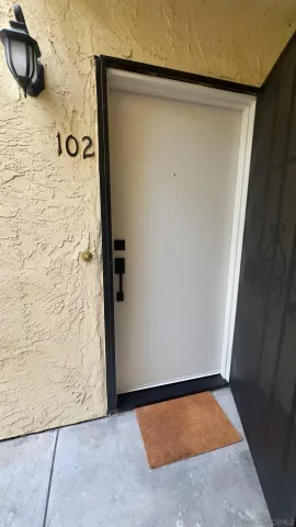 a view of street with parked cars