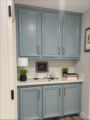 a kitchen with a sink and cabinets