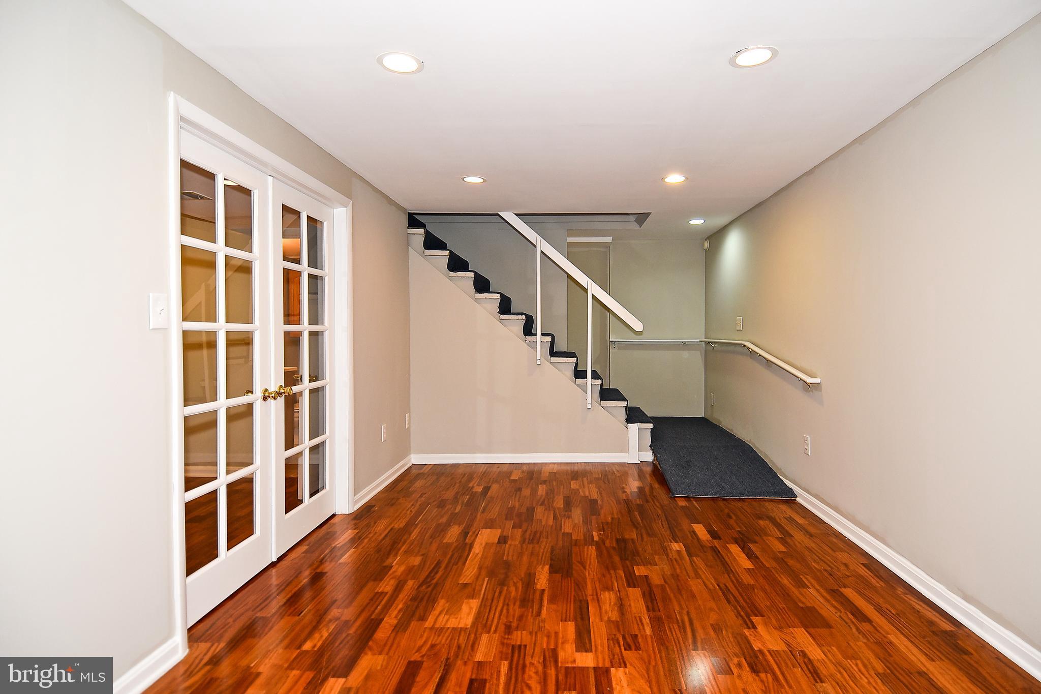 6436 Bowie Drive Springfield, VA 22150 - Photo 33 of 49 Laminate Wood Floors on Lower Level