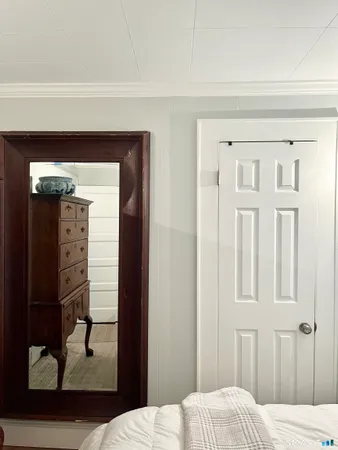 a front view of a house with a rug