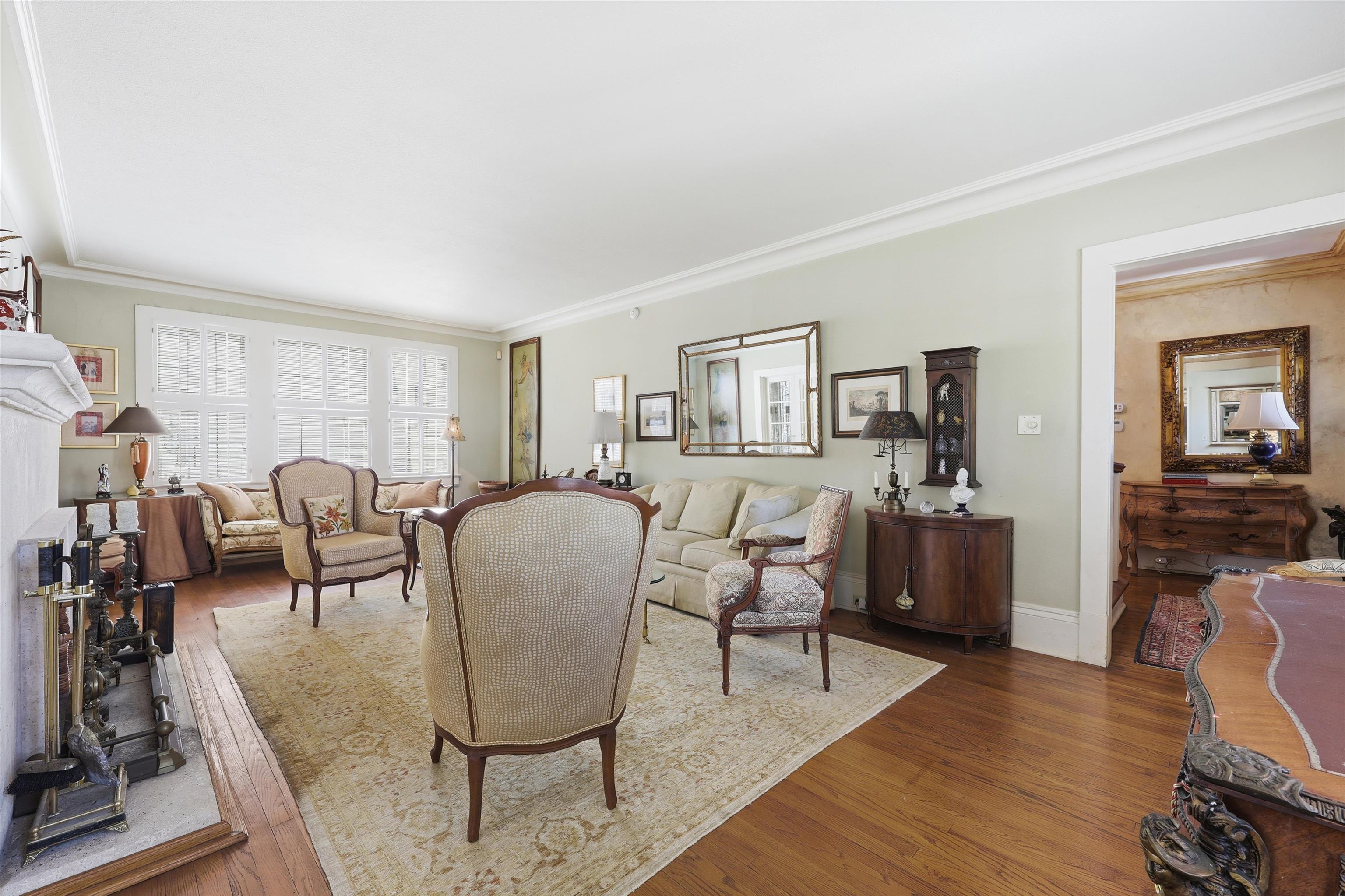 124 Marine Street St. Augustine, FL 32084 - Photo 17 of 41 a living room with furniture a dining table and wooden floor