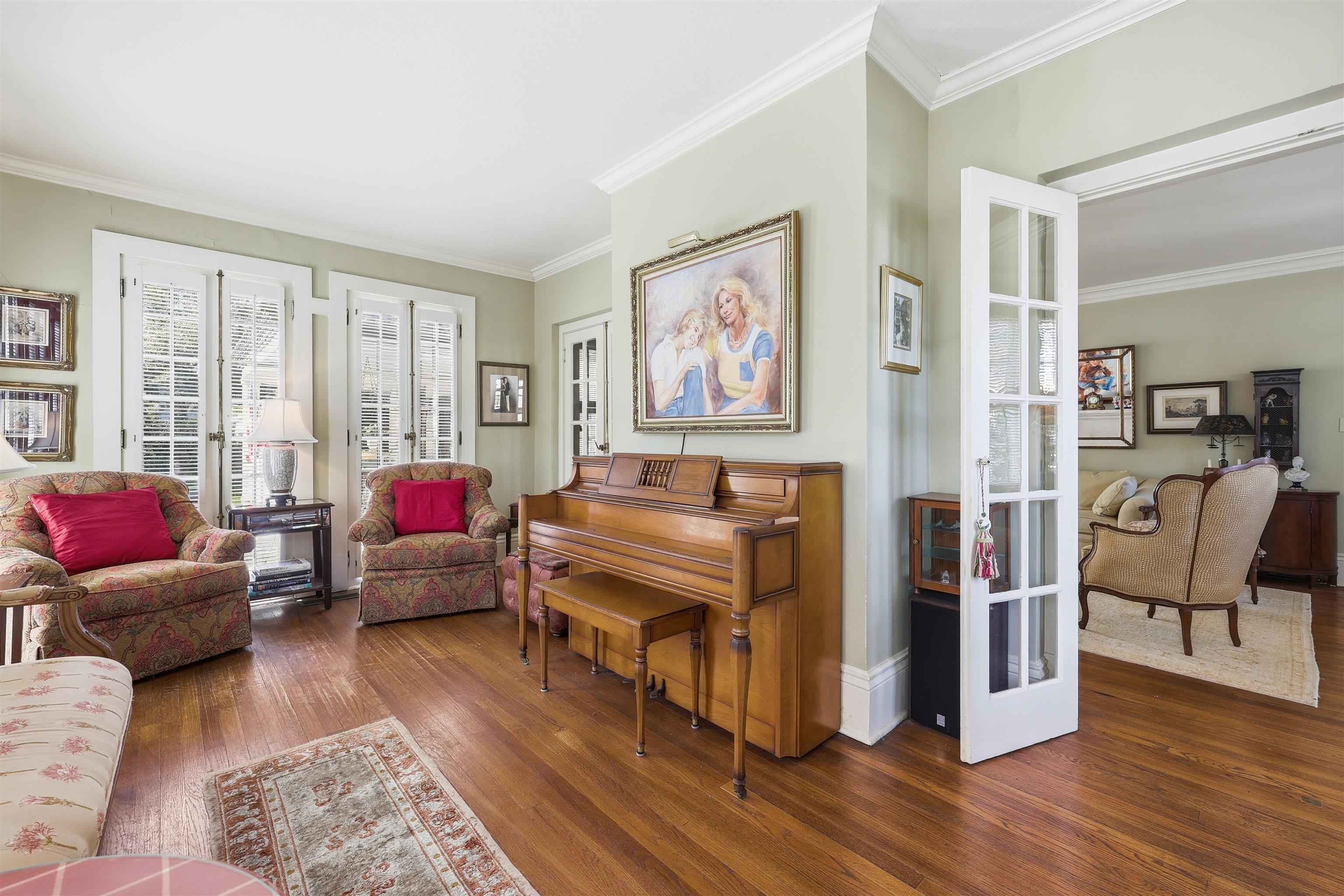 124 Marine Street St. Augustine, FL 32084 - Photo 20 of 41 a living room with furniture and a flat screen tv