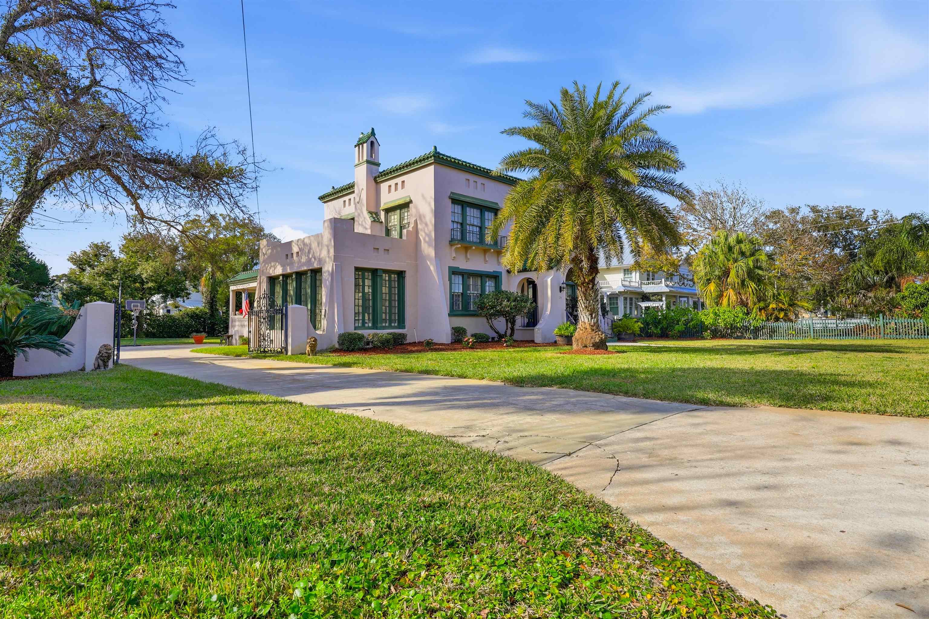 124 Marine Street St. Augustine, FL 32084 - Photo 34 of 41 a view of swimming pool with outdoor seating and trees