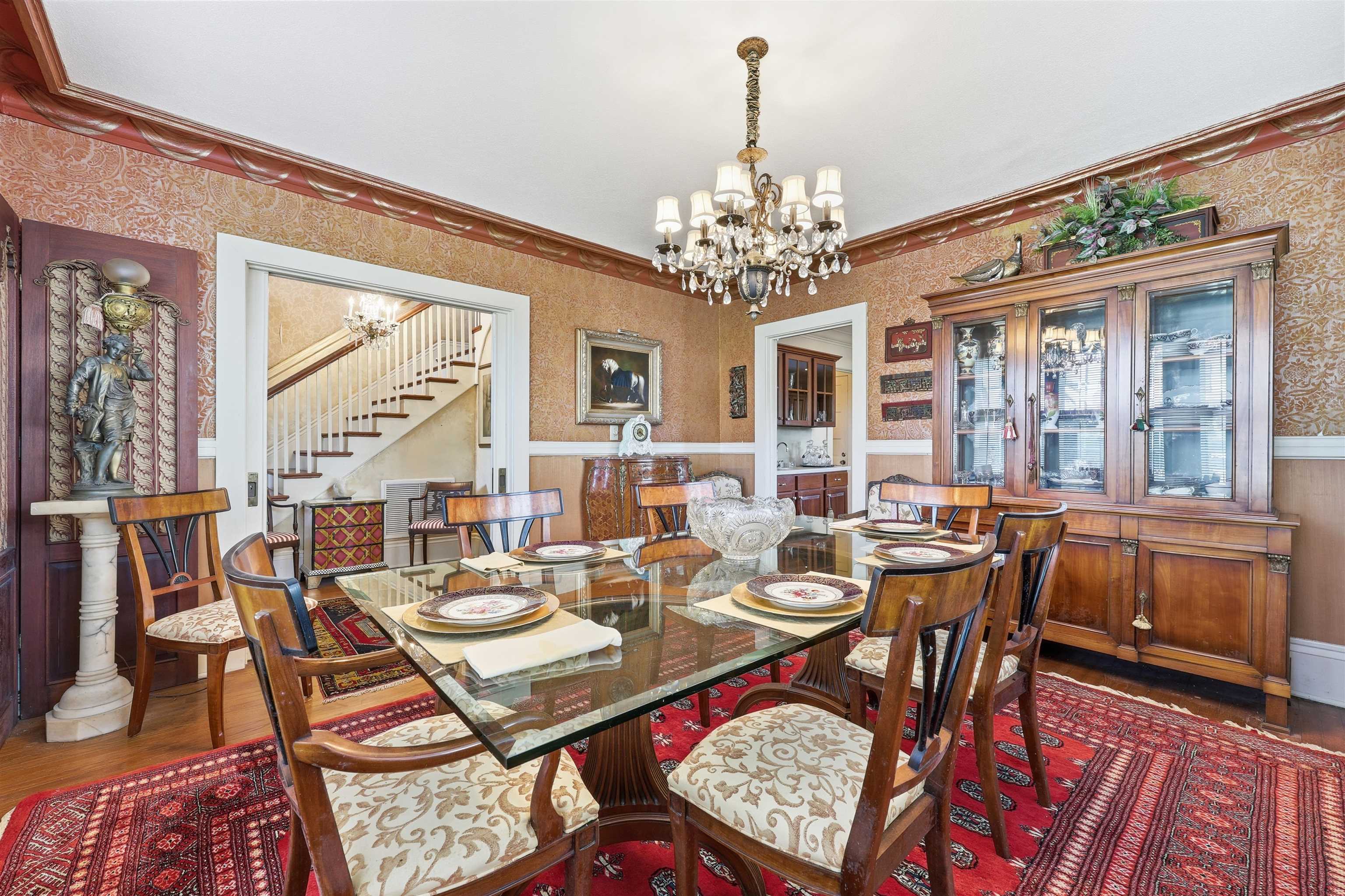 124 Marine Street St. Augustine, FL 32084 - Photo 7 of 41 a view of a dining room with furniture window and wooden floor