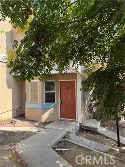 a house with trees in front of it
