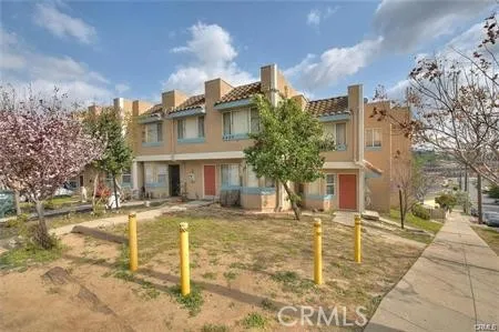 a front view of a building with street view