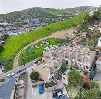 an aerial view of a house with a garden