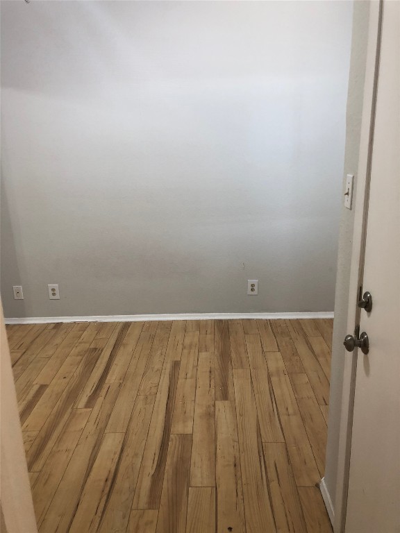 3316 Guadalupe Street, Unit 201 Austin, TX 78705 - Photo 11 of 19 wooden floor in a bathroom
