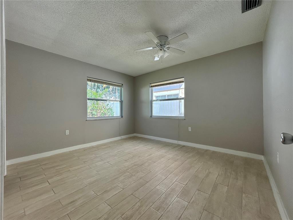 144 175th Avenue East, Unit 1 Redington Shores, FL 33708 - Photo 12 of 15 a view of an empty room with a window