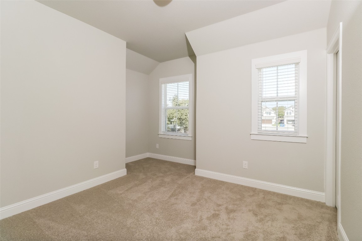 2605 Sam Bass Road, Unit 42 Round Rock, TX 78681 - Photo 14 of 27 an empty room with windows