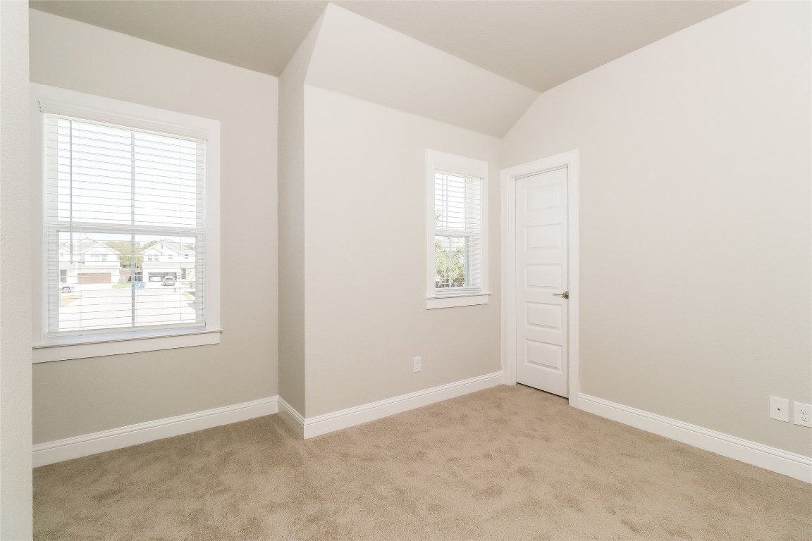 2605 Sam Bass Road, Unit 42 Round Rock, TX 78681 - Photo 15 of 27 an empty room with windows
