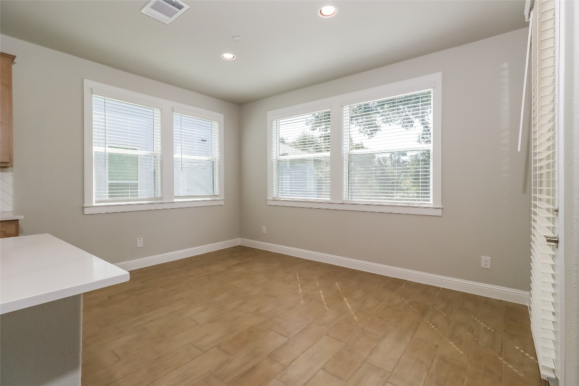 2605 Sam Bass Road, Unit 42 Round Rock, TX 78681 - Photo 4 of 27 an empty room with windows