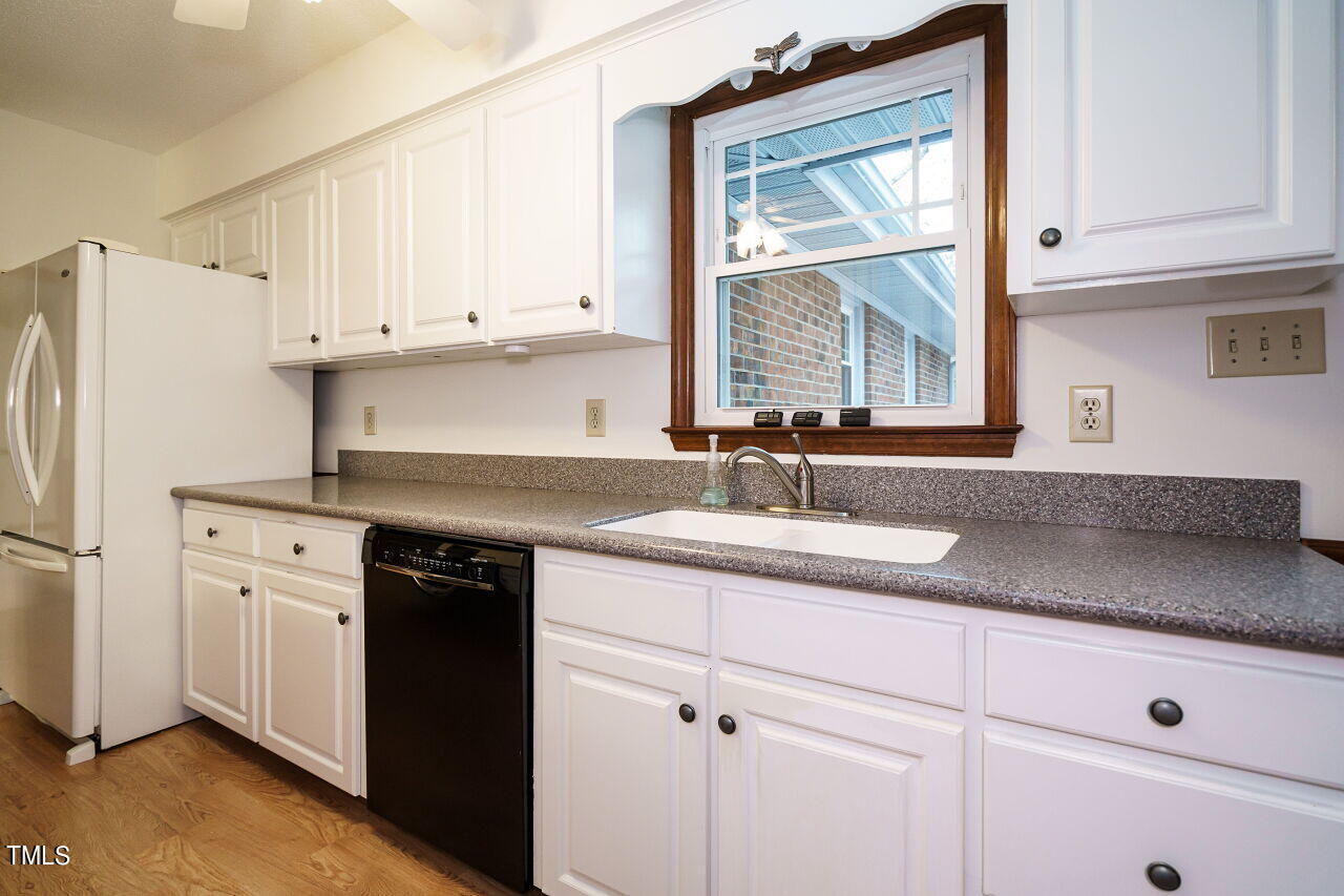 5917 Countryview Lane Raleigh, NC 27606 - Photo 10 of 43 Abundant cabinet and counter storage are at your disposal. No need to worry about clutter or lack of space; this kitchen has it all. From pots and pans to pantry items, you'll find a place for everything.