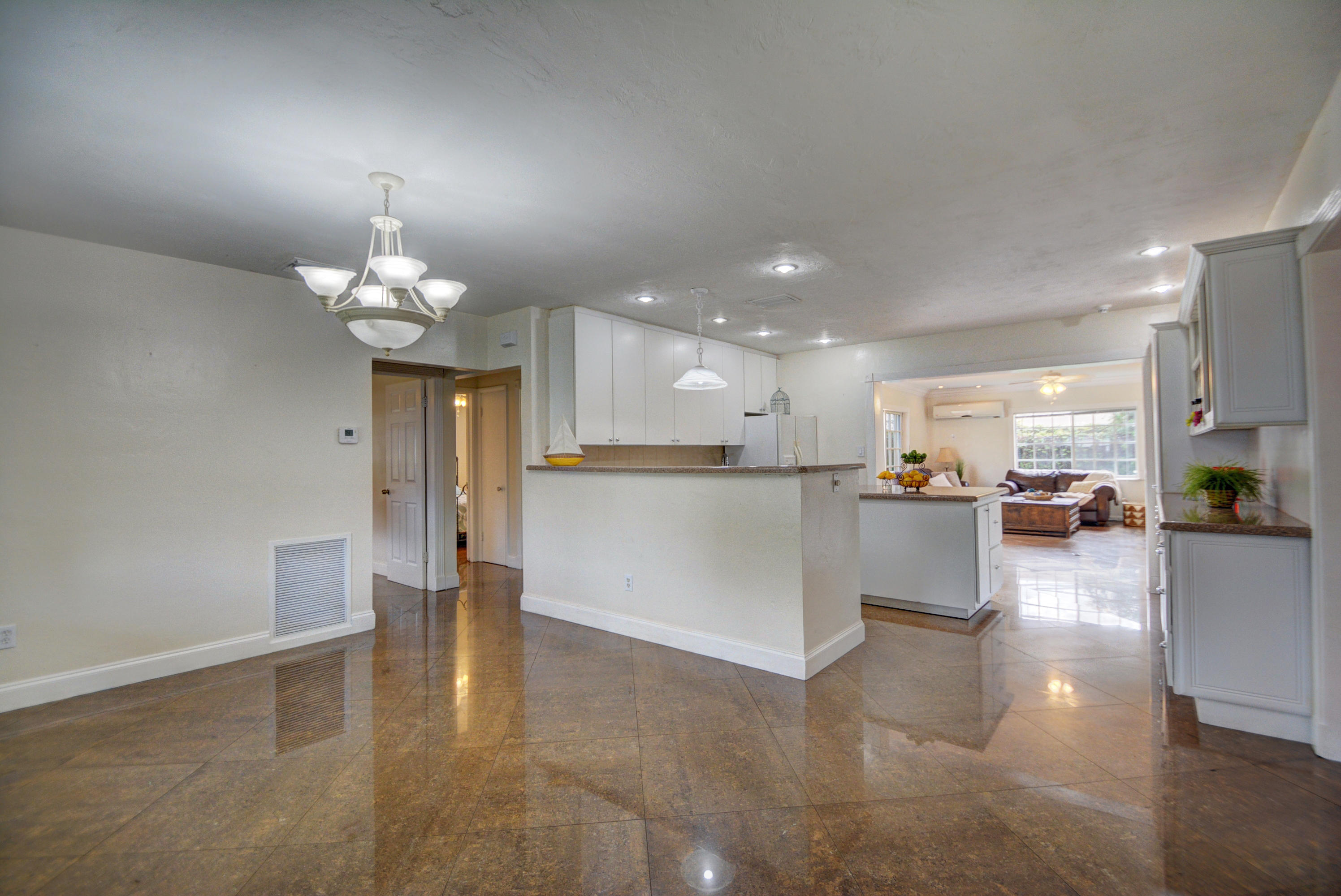 310 Northwest 21st Street Boca Raton, FL 33431 - Photo 4 of 25 Dining area opens to kitchen