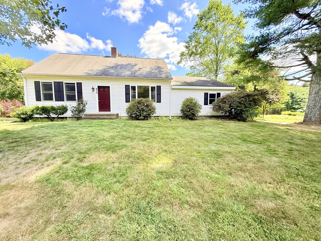 front view of a house and a yard