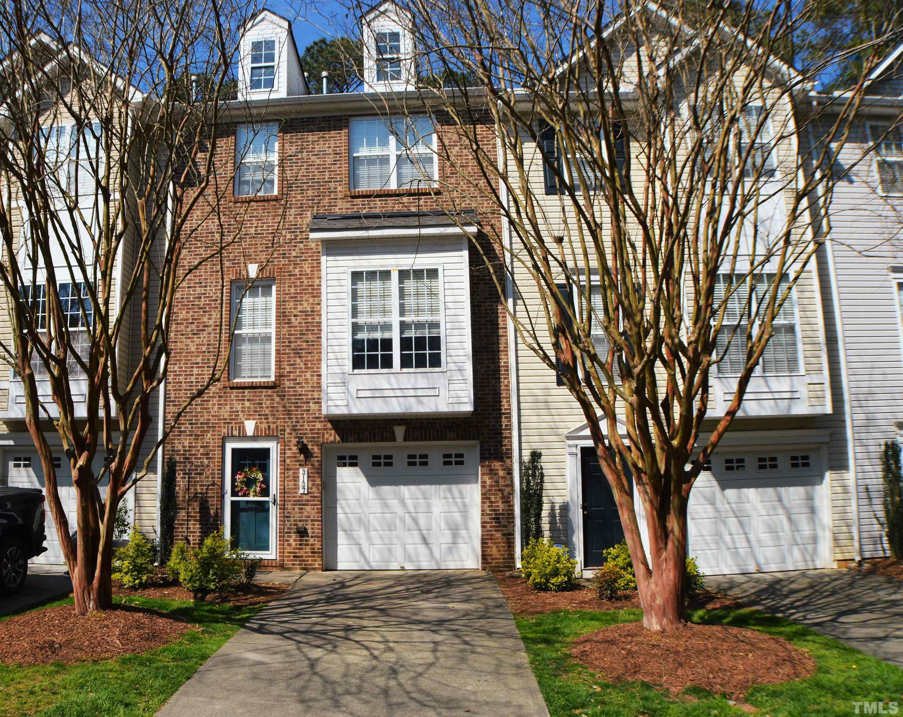 3137 Winding Waters Way Raleigh, NC 27614 - Photo 1 of 54 a front view of a house with a yard