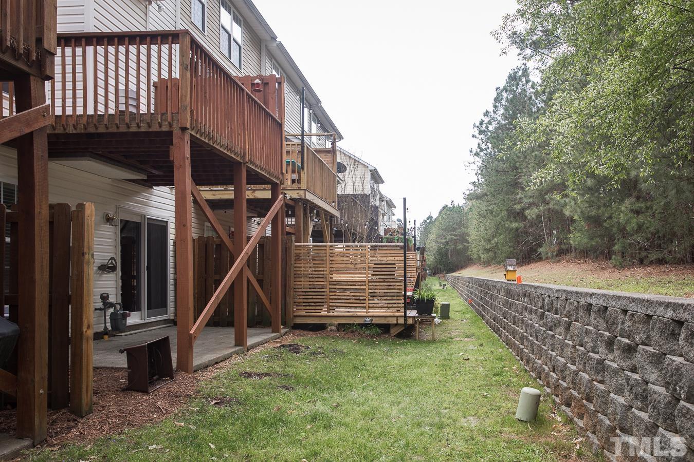 3137 Winding Waters Way Raleigh, NC 27614 - Photo 50 of 54 a view of a house with a backyard