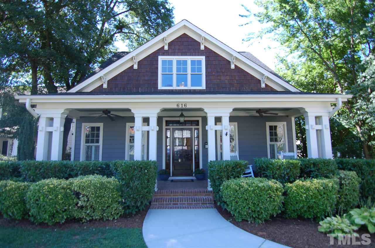 616 New Road Raleigh, NC 27608 - Photo 1 of 25 a front view of a house with yard and green space