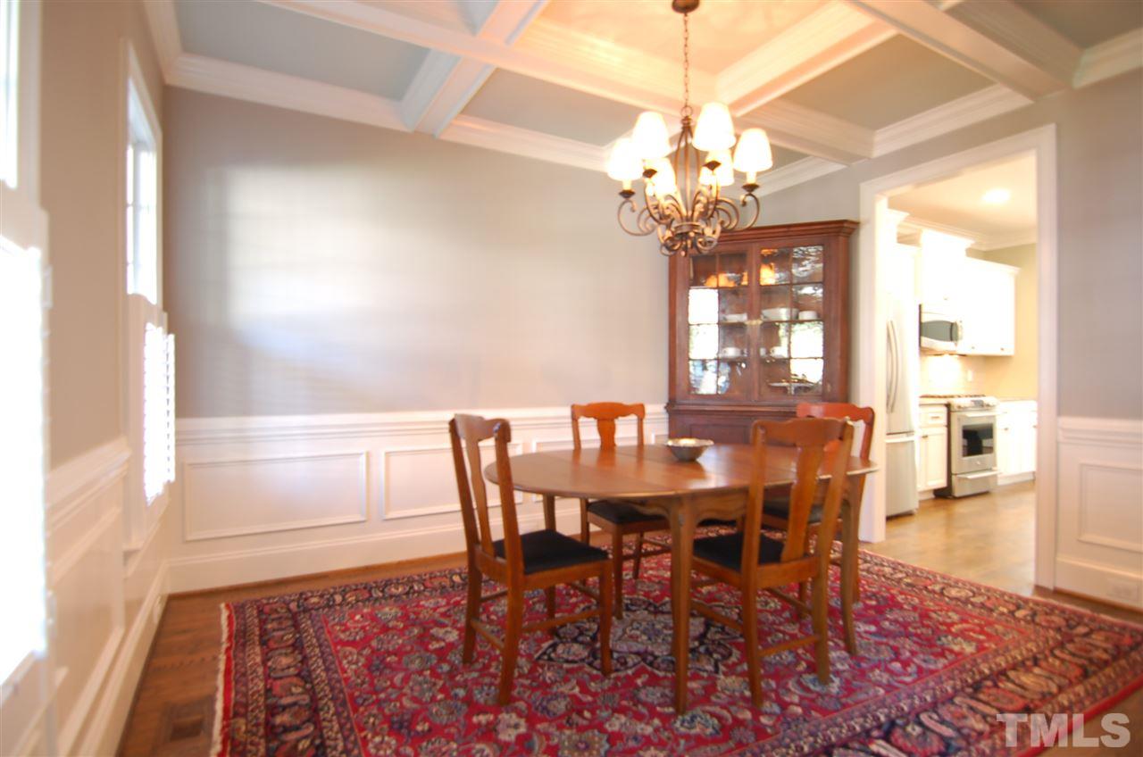 616 New Road Raleigh, NC 27608 - Photo 4 of 25 a view of a dining room with furniture window and wooden floor