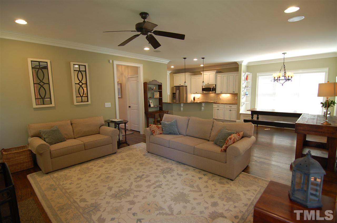 616 New Road Raleigh, NC 27608 - Photo 6 of 25 a living room with furniture and a large window