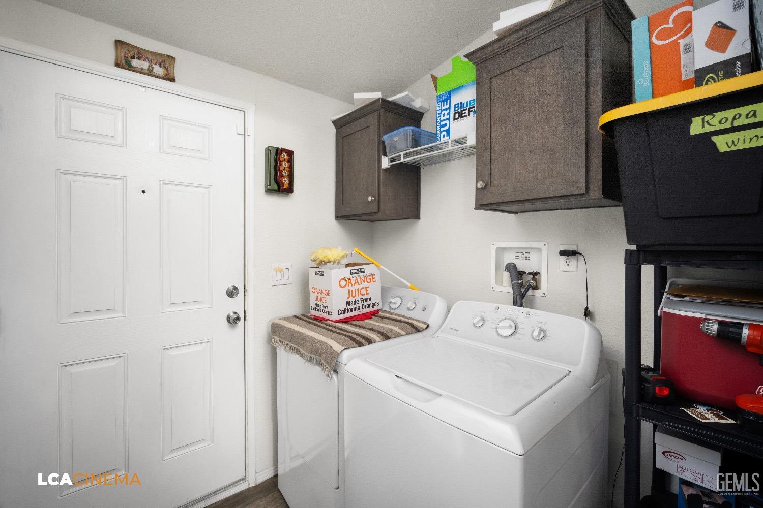 Undisclosed Address Bakersfield, CA 93304 - Photo 11 of 18 a utility room with dryer and washer