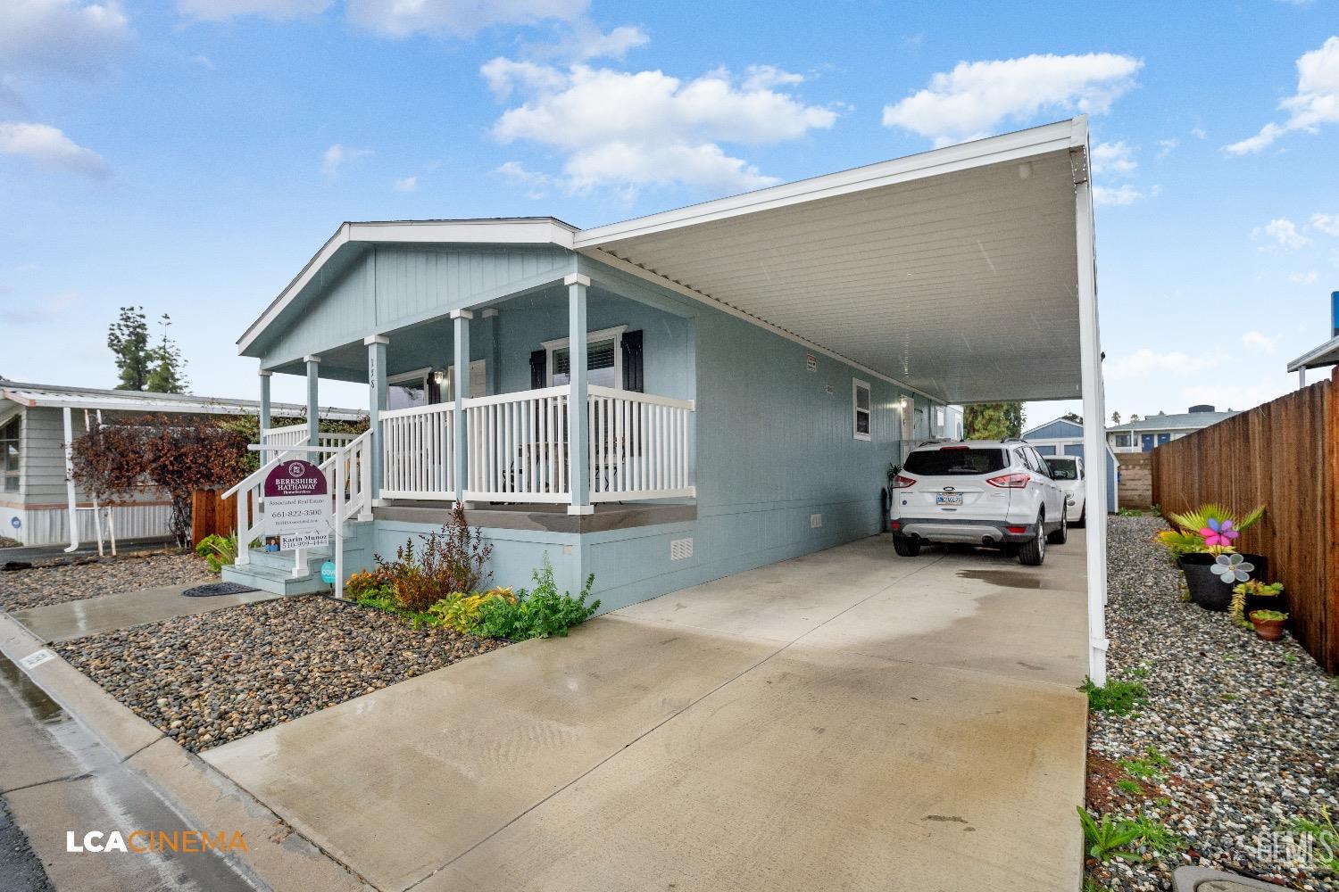 Undisclosed Address Bakersfield, CA 93304 - Photo 4 of 18 a car parked in front of house