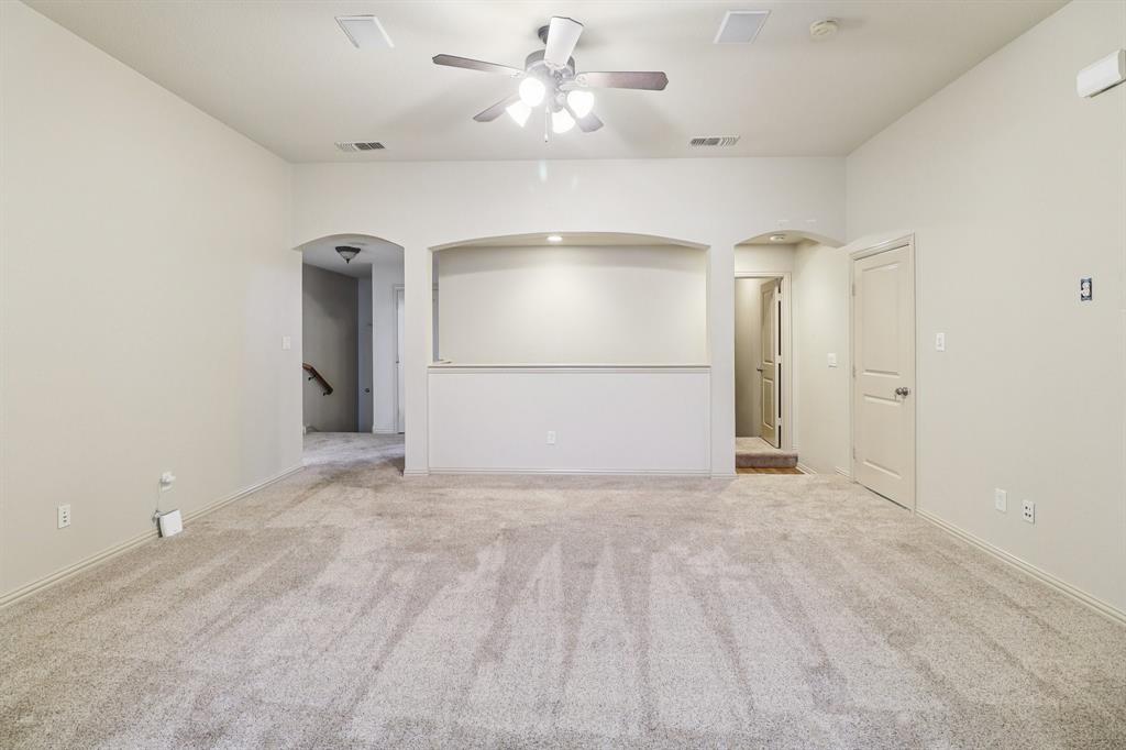 219 High Point Drive Murphy, TX 75094 - Photo 19 of 30 Upstairs Gameroom - large bonus space with easy access to nearby rooms.
