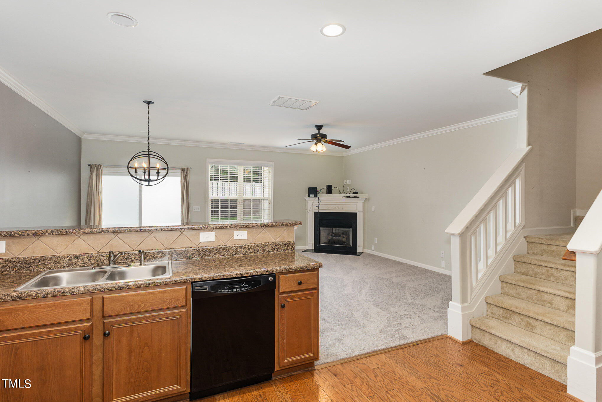 206 Leighann Ridge Lane Rolesville, NC 27571 - Photo 16 of 38 a kitchen with kitchen island granite countertop a stove and a sink
