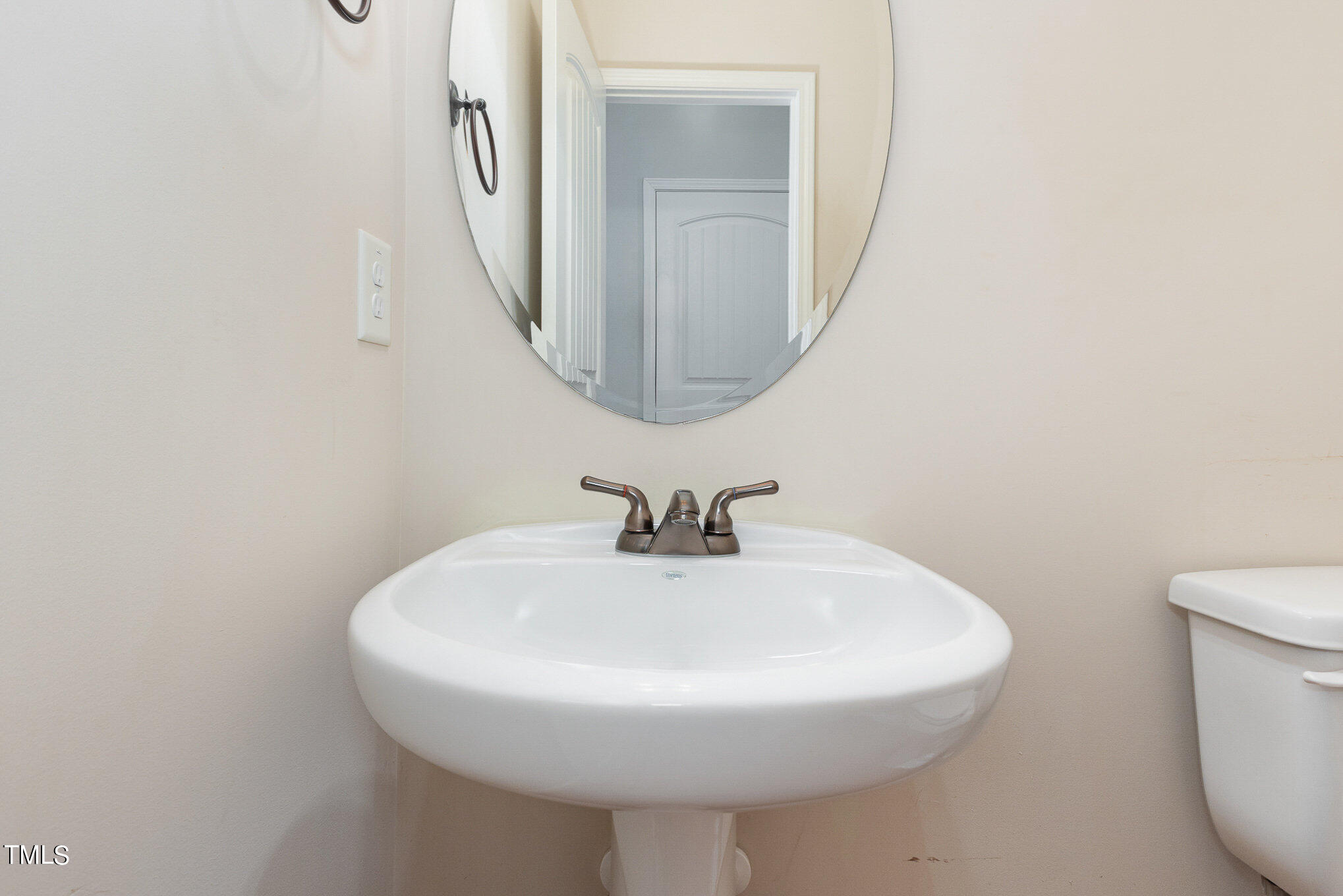 206 Leighann Ridge Lane Rolesville, NC 27571 - Photo 19 of 38 a bathroom with a sink and a mirror
