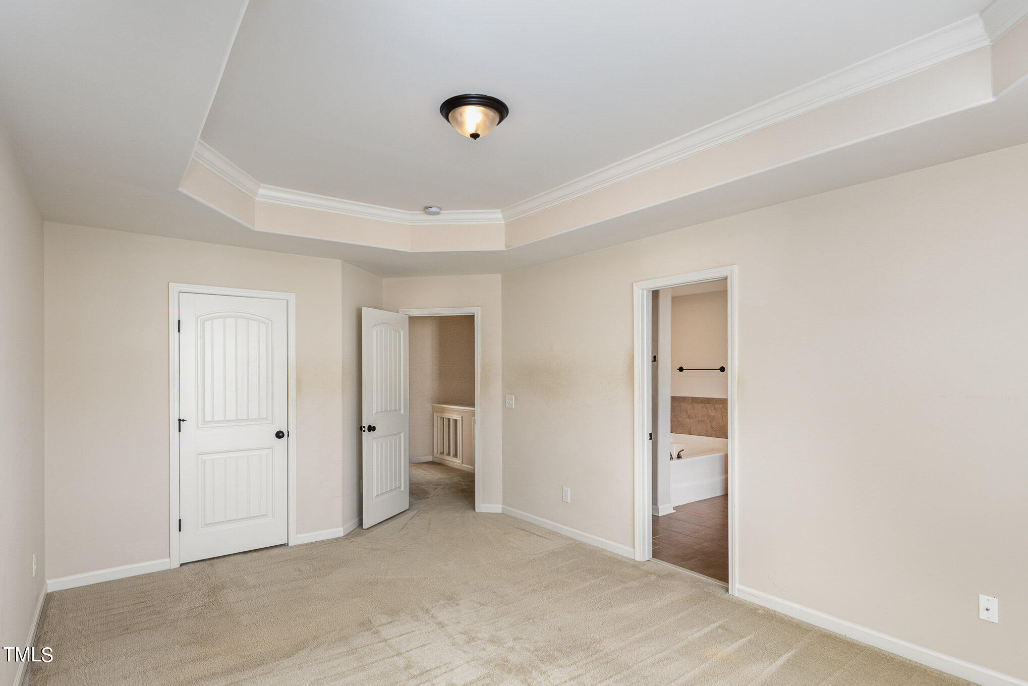 206 Leighann Ridge Lane Rolesville, NC 27571 - Photo 22 of 38 an empty room with closet and a bathroom