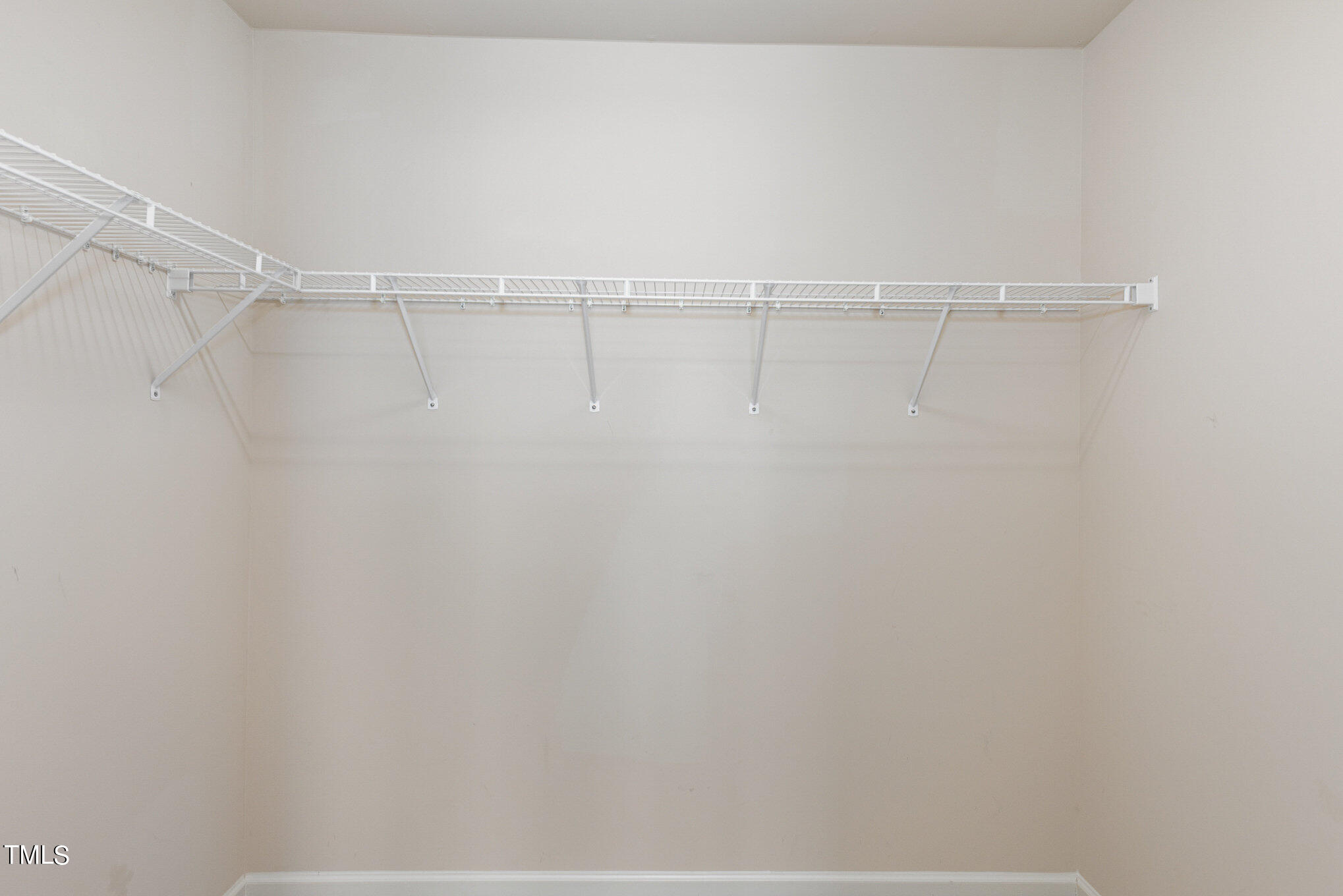 206 Leighann Ridge Lane Rolesville, NC 27571 - Photo 23 of 38 a view of a room with racks on the wall