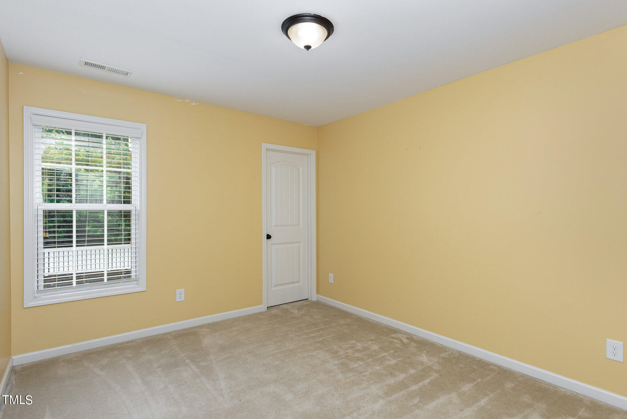 206 Leighann Ridge Lane Rolesville, NC 27571 - Photo 29 of 38 a view of an empty room with a window