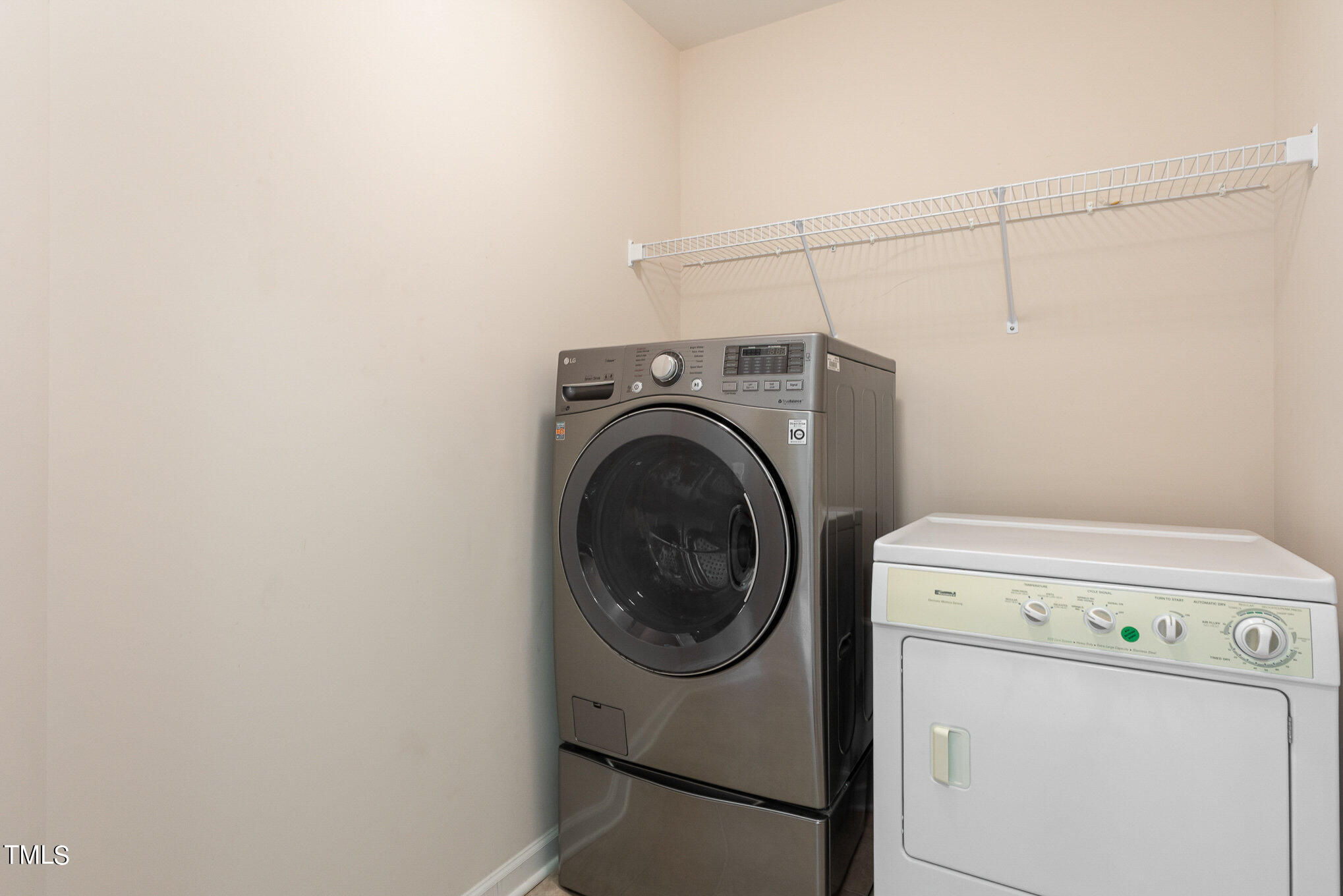 206 Leighann Ridge Lane Rolesville, NC 27571 - Photo 32 of 38 a utility room with dryer and washer