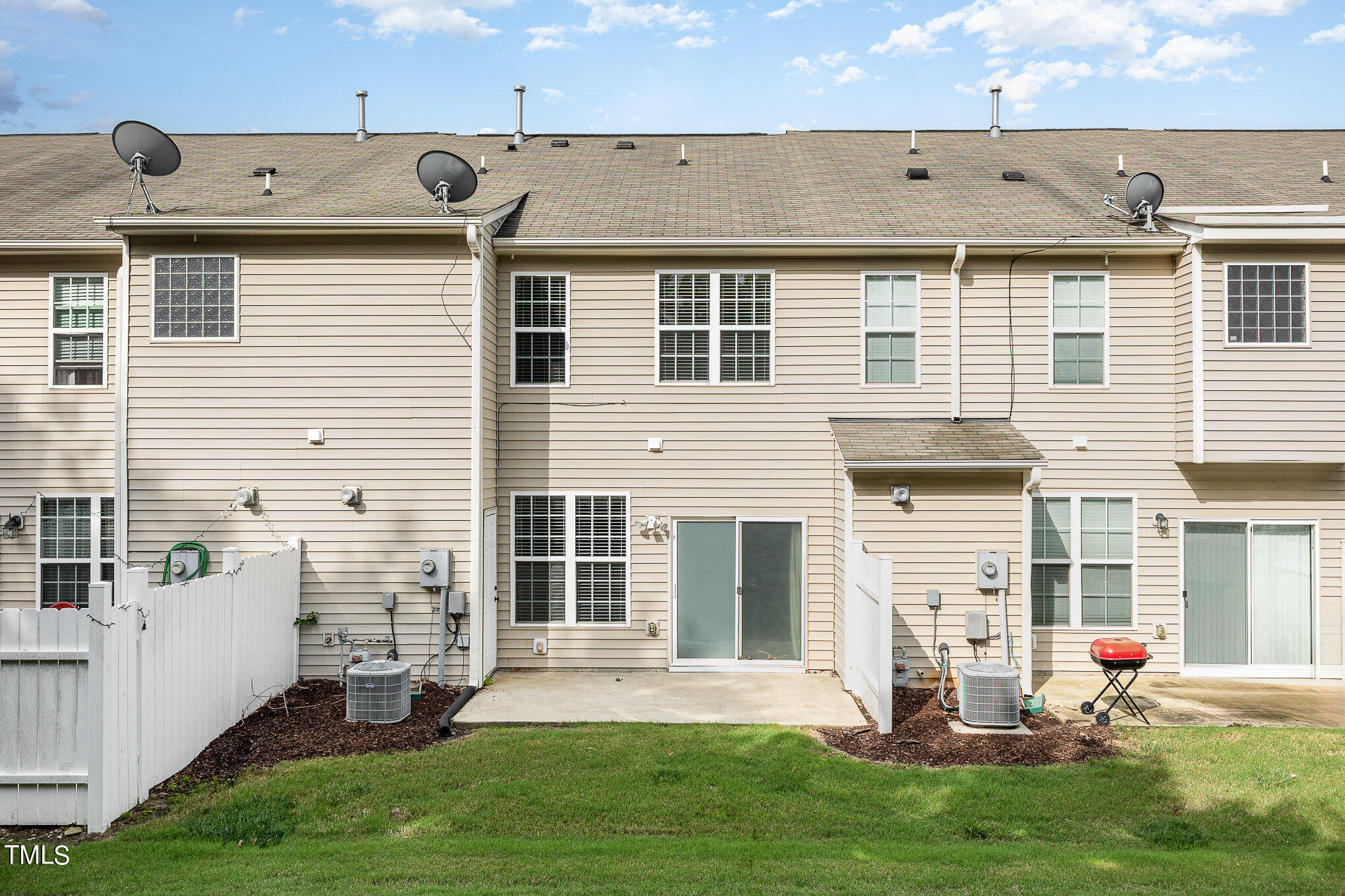 206 Leighann Ridge Lane Rolesville, NC 27571 - Photo 35 of 38 a view of a house with a yard and a fireplace