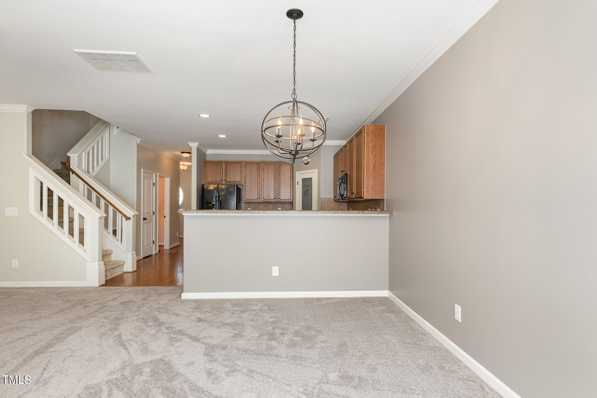 206 Leighann Ridge Lane Rolesville, NC 27571 - Photo 7 of 38 a view of a hallway with entryway chandelier and entryway
