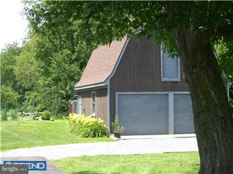 75 Gilbert Road Bordentown, NJ 08505 - Photo 2 of 12 a house with trees in front of it