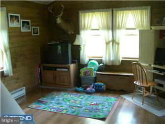75 Gilbert Road Bordentown, NJ 08505 - Photo 7 of 12 a room with furniture and a window