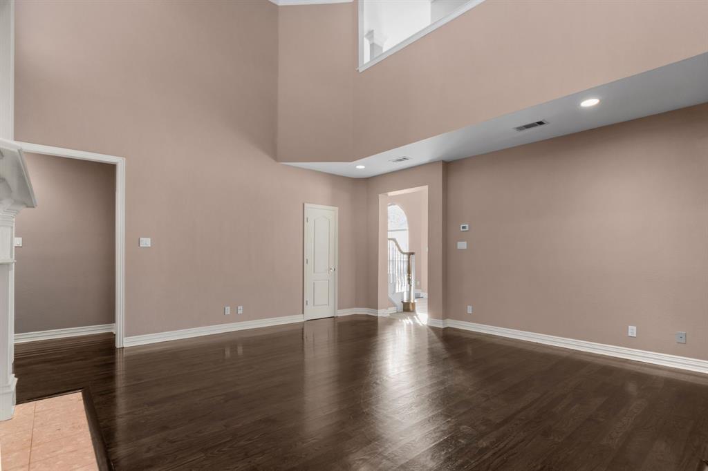 2 Shields Court Trophy Club, TX 76262 - Photo 11 of 39 a view of an empty room with wooden floor