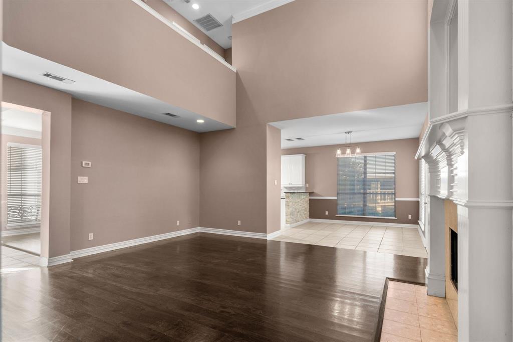 2 Shields Court Trophy Club, TX 76262 - Photo 12 of 39 a view of a livingroom with wooden floor