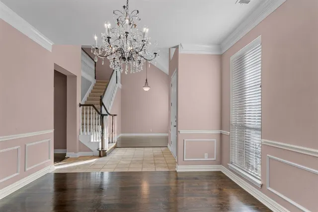 a view of entryway with wooden floor