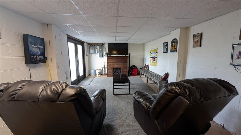203 Colvin Road Greensboro, PA 15338 - Photo 15 of 20 a living room with furniture a couch and a flat screen tv