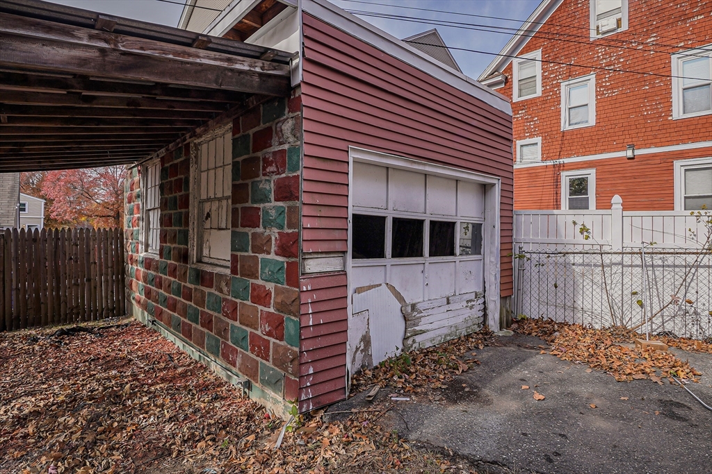 18 Sycamore Street Springfield, MA 01109 - Photo 21 of 22 a view of a house with a yard