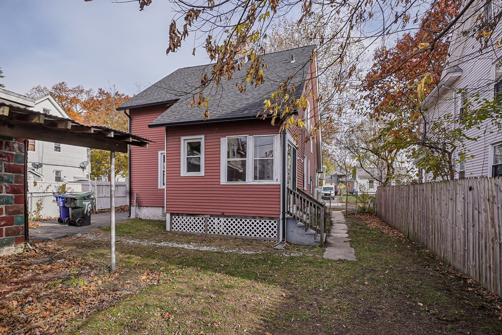 18 Sycamore Street Springfield, MA 01109 - Photo 22 of 22 a view of a house with a yard